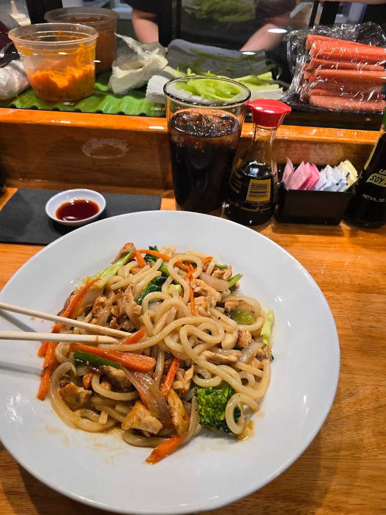 Savory stir-fried udon noodles with veggies at Otaka Sushi & Grill, a Asian Fusion Restaurant in Manchester