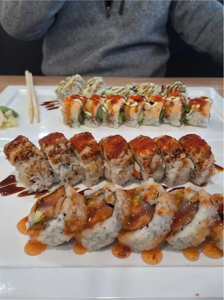 Assorted sushi rolls served on a platter at Otaka Sushi & Grill, a Asian Fusion Restaurant in Manchester